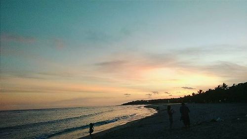 Scenic view of sea at sunset