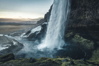 The beautiful seljalandsfoss waterfall on a winter morning