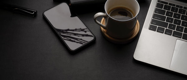 Coffee cup on table