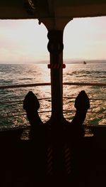 Silhouette of sea against sky during sunset