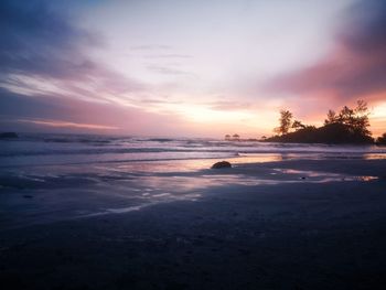 Scenic view of sea against sky at sunset