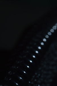 Close-up of metal grate on table