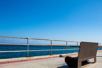 A bench with a beautiful view of the sea