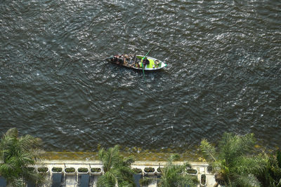 High angle view of people in boat on lake