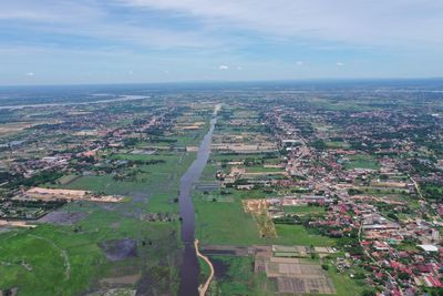 Aerial view of city against sky