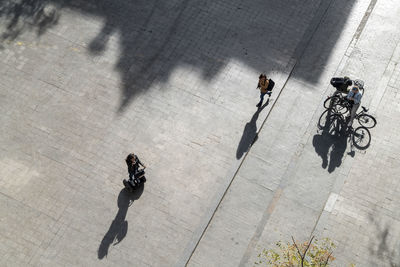 High angle view of people walking on street