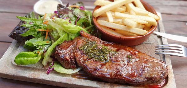 Close-up of food served on table