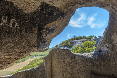 Scenic view of rock formation against sky