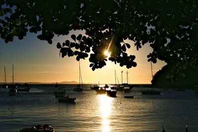 Scenic view of sea against sky at sunset
