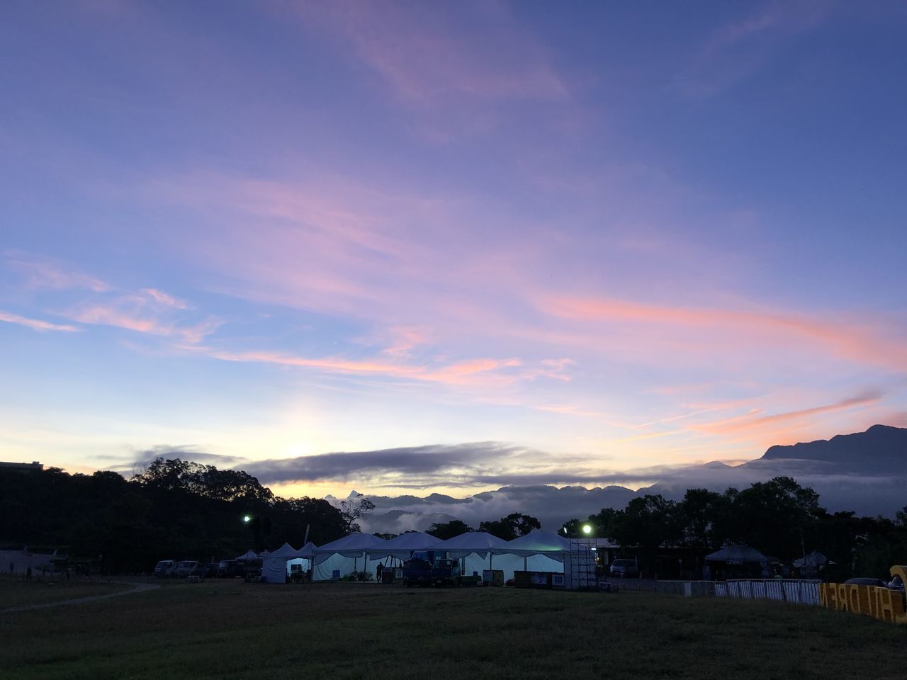 SCENIC VIEW OF LANDSCAPE AGAINST SKY AT SUNSET