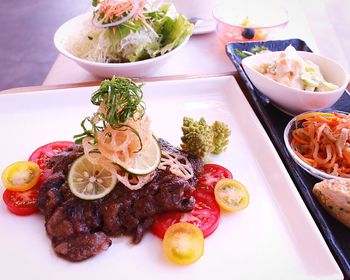 Close-up of served food on table