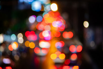 Defocused image of illuminated lights at night