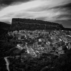 Townscape against cloudy sky