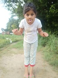 Portrait of girl standing outdoors