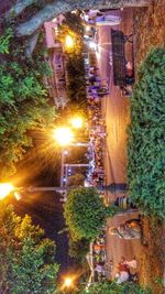 High angle view of illuminated town at night