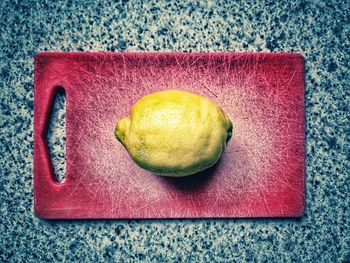 High angle view of fruits on cutting board