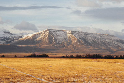 Scenic view of snowcapped mountains against sky