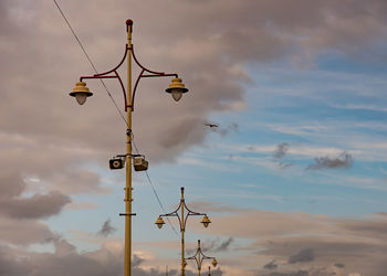 Low angle view of cables against sky