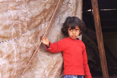 Girl standing outdoors