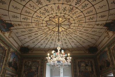 Low angle view of illuminated ceiling