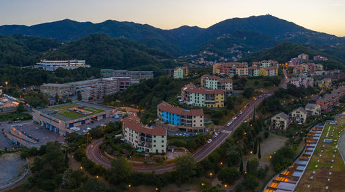 High angle view of buildings in city against sky