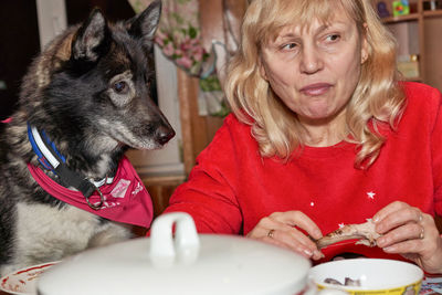 Portrait of woman with dog