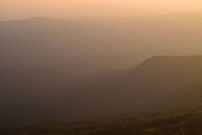 Scenic view of mountains during sunset