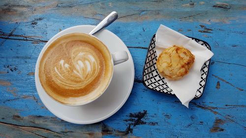 High angle view of cappuccino on table