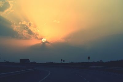 Road against sky during sunset