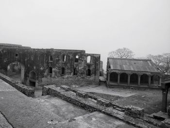 Old ruins of building against clear sky