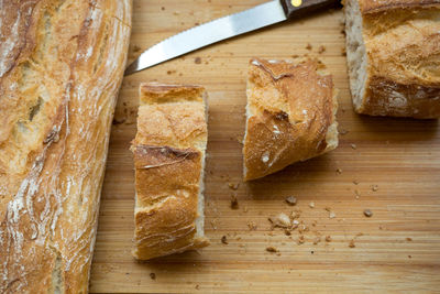 High angle view of bread on cutting board