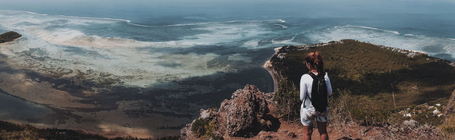 Panoramic view of man standing at beach