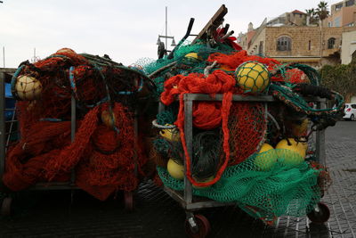 Close-up of fishing net hanging on rope