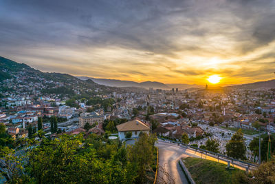 High angle view of townscape against sky at sunset