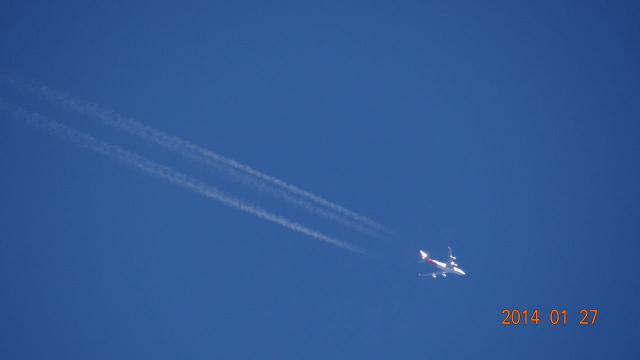 blue, flying, low angle view, mid-air, copy space, air vehicle, clear sky, transportation, airplane, on the move, motion, vapor trail, mode of transport, nature, sky, travel, outdoors, day, speed, beauty in nature