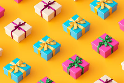 High angle view of multi colored pencils on paper