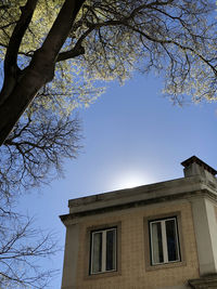 Low angle view of building against clear blue sky