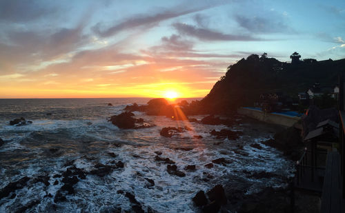 Scenic view of sea against sky during sunset