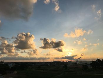 Scenic view of land against sky during sunset