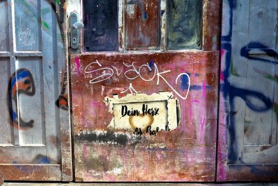 Close-up of graffiti on wall