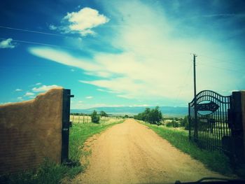 Empty road along landscape