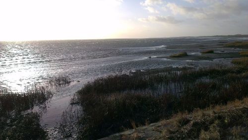 View of calm sea at sunset