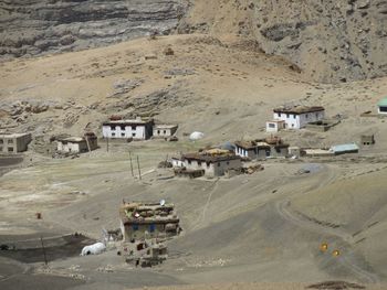 High angle view of houses on land