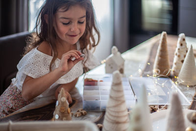 Portrait of cute girl at home