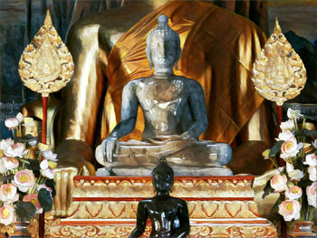 Buddha statue in temple outside building