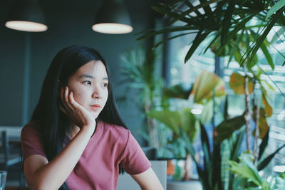 Portrait of a teenage girl looking away