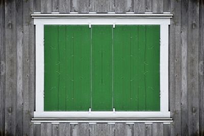 Close-up of closed window of building