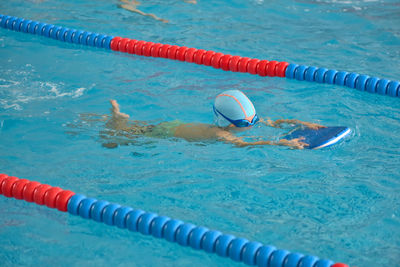 High angle view of person swimming in pool