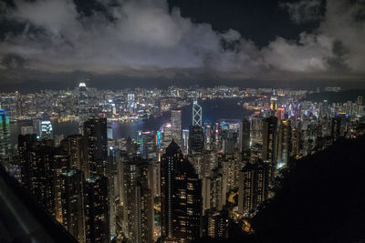 Aerial view of city lit up at night