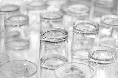 Close-up of glasses arranged on table